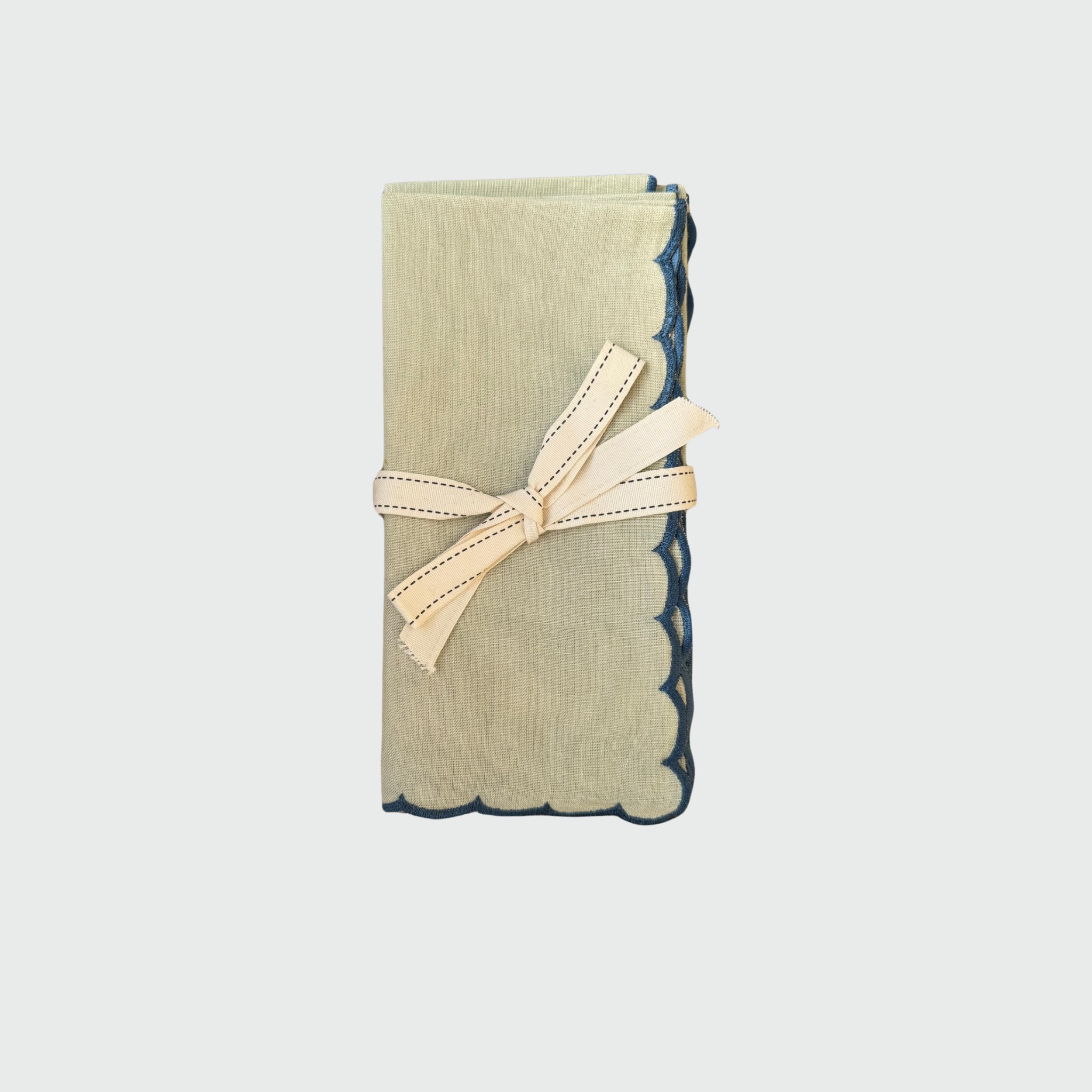 Serviette menthe à bord festonné bleu